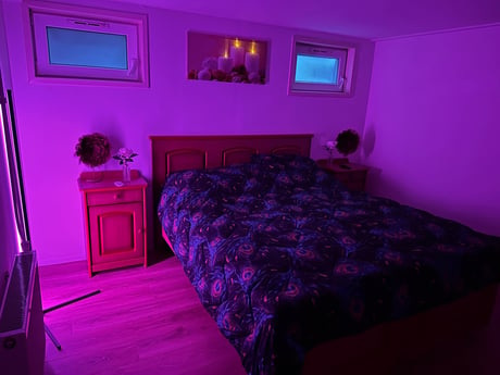 Bedroom with LED lighting on.