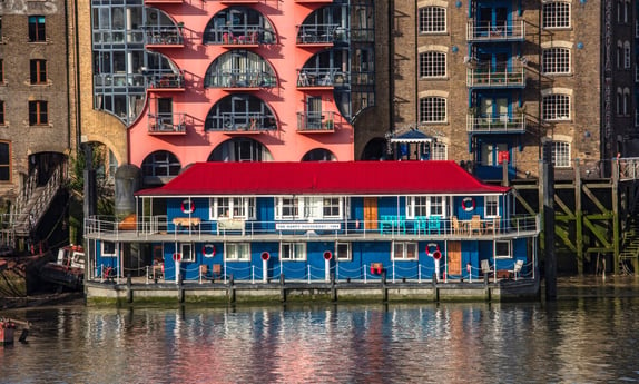 Extraordinary houseboat near Tower Bridge from the river